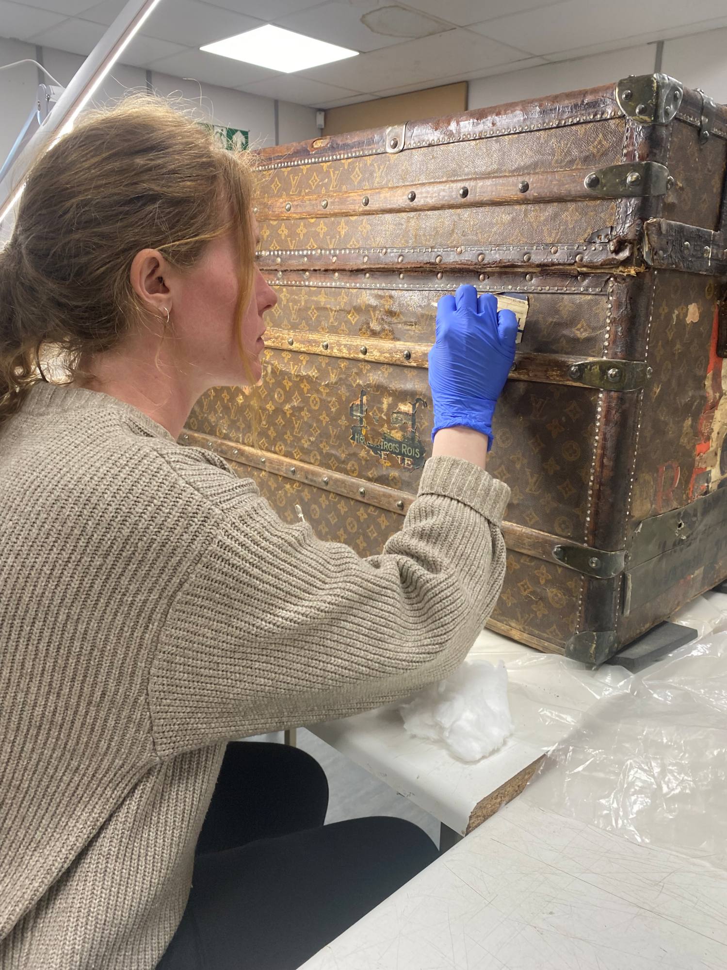 Solvent cleaning the painted textile covering on the Louis Vuitton Travel Trunk, Scottish Maritime Museum 1.jpg